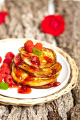 Delicious pancakes with raspberries