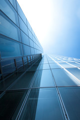 Fototapeta na wymiar Abstract building. blue glass wall of skyscraper