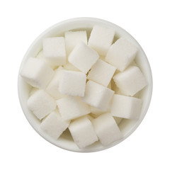 Sugar cubes in a bowl isolated on white background