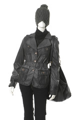 Full-length female in black jacket with bag o on mannequin