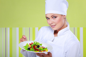 young chef woman prepare and decorating tasty food in kitchen
