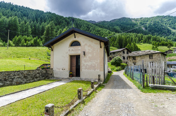 Fototapeta na wymiar Stone houses. Traditional alpine village in the mountains
