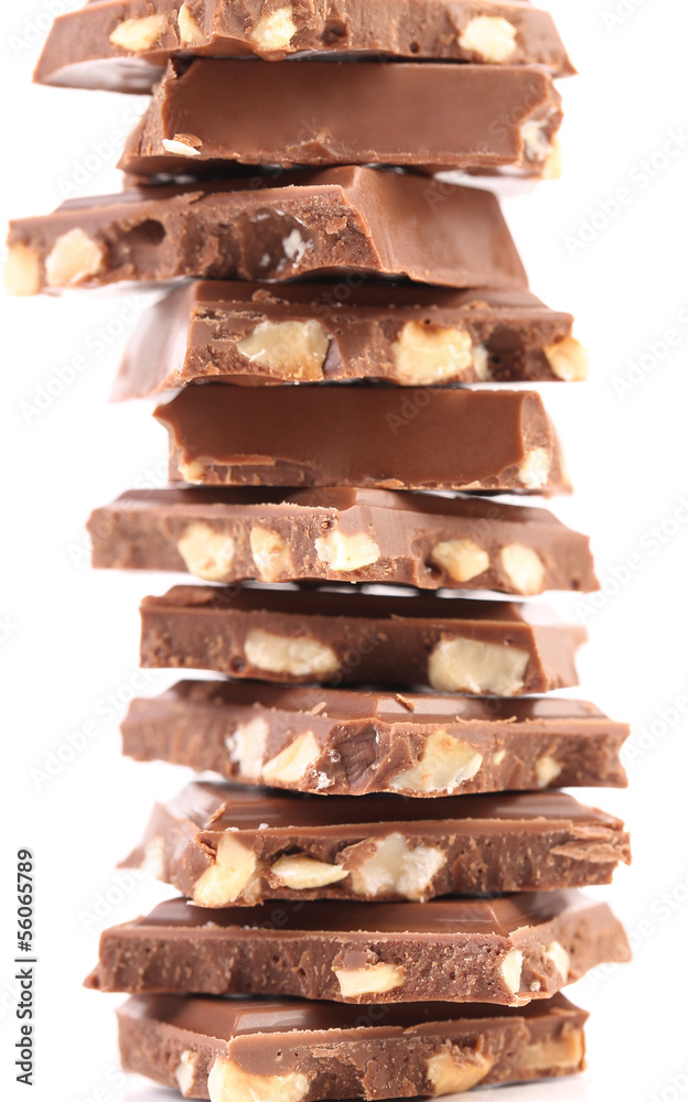 Poster Stack of chocolate with nuts.