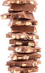 Stack of chocolate with nuts.