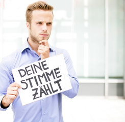 Mann fordert zur Wahl