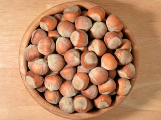 Hazelnuts in a wooden bowl