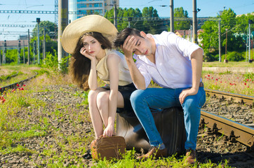 Young couple upset because they lost the train