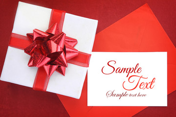 Gift box with ribbon and white card
