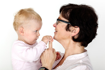 Woman holding infant in arms