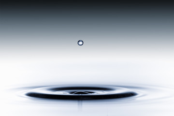 splash of water drops on a blue background