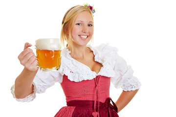 Frau im Dirndl mit einem Krug Bier