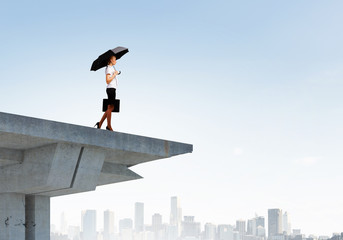 Businesswoman on bridge