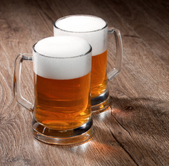 Two glass beer on wooden table