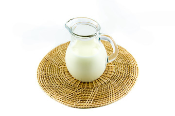 Glass jug of fresh milk