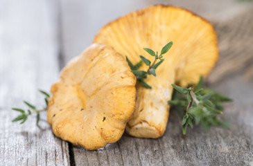 Raw Chanterelles on wood