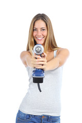 Beautiful woman pointing to a camera with a power drill