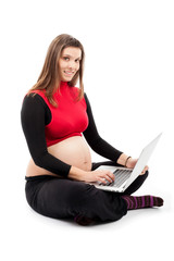 Naklejka premium Pregnant Smilling Woman with laptop