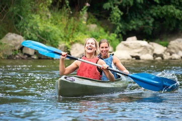 Foto op Canvas Women kayaking © corepics