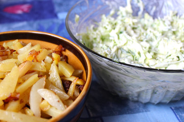 plate full of tasty chips and salad from cabbage