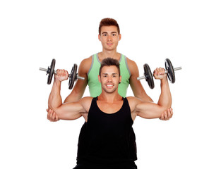 Fototapeta na wymiar Couple of friends lifting weights