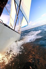 Obraz premium Sailboat yacht sailing in blue sea. Tourism