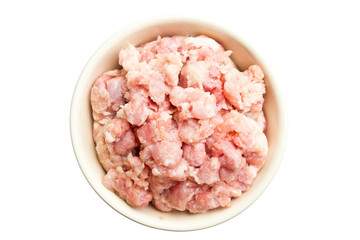 Minced pork in a bowl on a white background