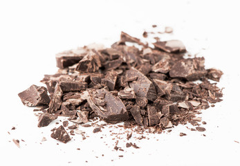 Fototapeta premium Chocolate pieces isolated on white background