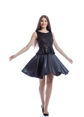 Cheerful sexy woman posing in stylish dress