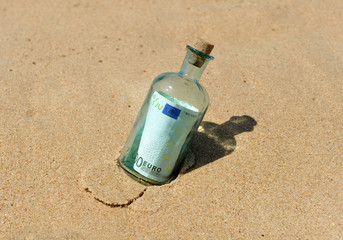 Bottle with euro banknote inside