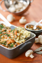 Baked potato with mushrooms and cheese