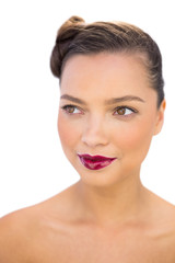 Fototapeta premium Pretty woman with red lips looking away