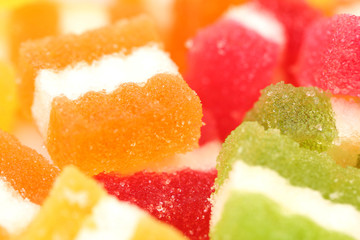 Background of different fruit-paste candies.