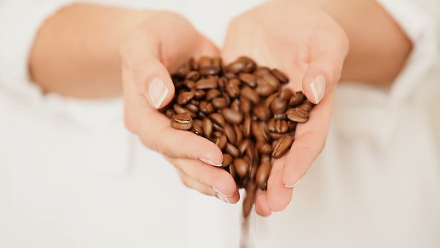 Coffee Beans in Her Hands