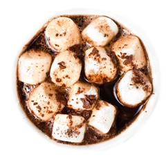 Hot chocolate with mini marshmallow  and cinnamon in a white cup