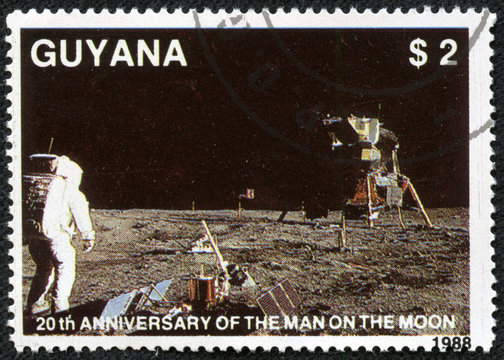 stamp from Guyana shows image of the first moon landing