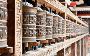 Prayer wheels in Rudra Varna Mahavihar temple in Patan. Nepal.