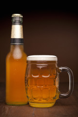 Glass and bottle of beer