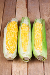 Ear of corn on wood © michalz86