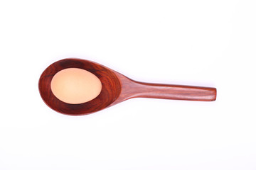 egg on wood spoon