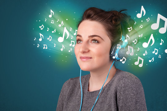 Young woman with headphones listening to music