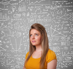 Young pretty lady with hand drawn calculations and icons