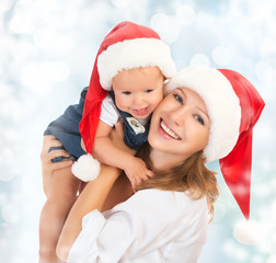 happy family mother and baby in Christmas hats