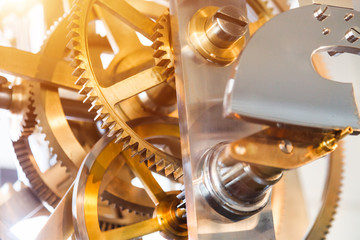 gears and mainspring in the mechanism of a pocket watch