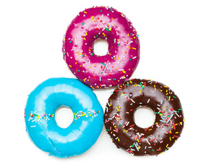 three color donuts, isolated on white