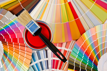Samples with different shades of red and can paint with brush.