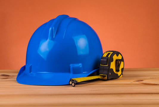 blue helmet on wooden table