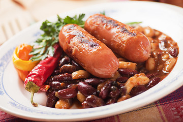 Grilled sausage with chili beans