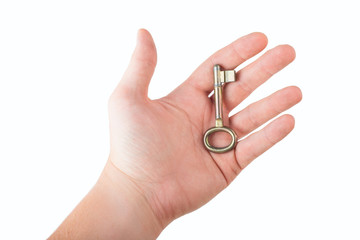 hand holding gold key