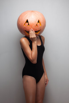 Smiling face of shy pumpkinhead model