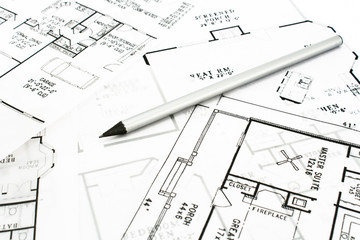 House plan blueprints with drawing pencil
